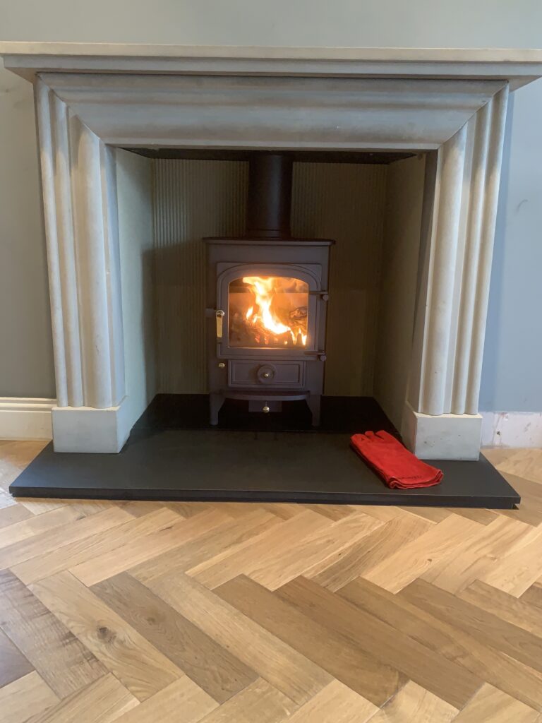 Clearview Pioneer 400 in limestone fireplace