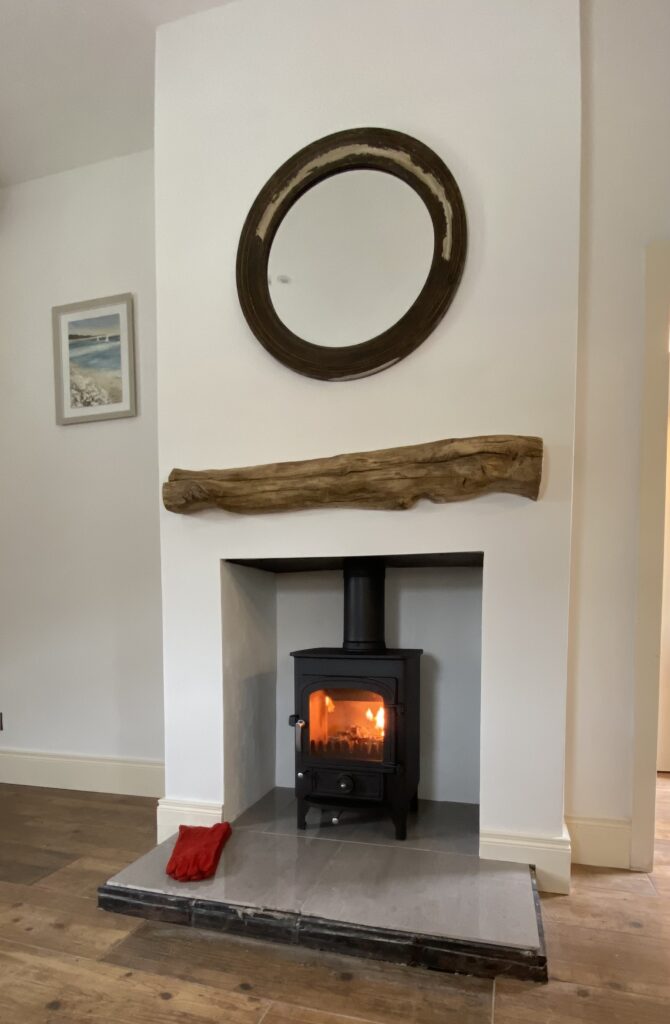 Clearview Pioneer 400 in rendered alcove fireplace