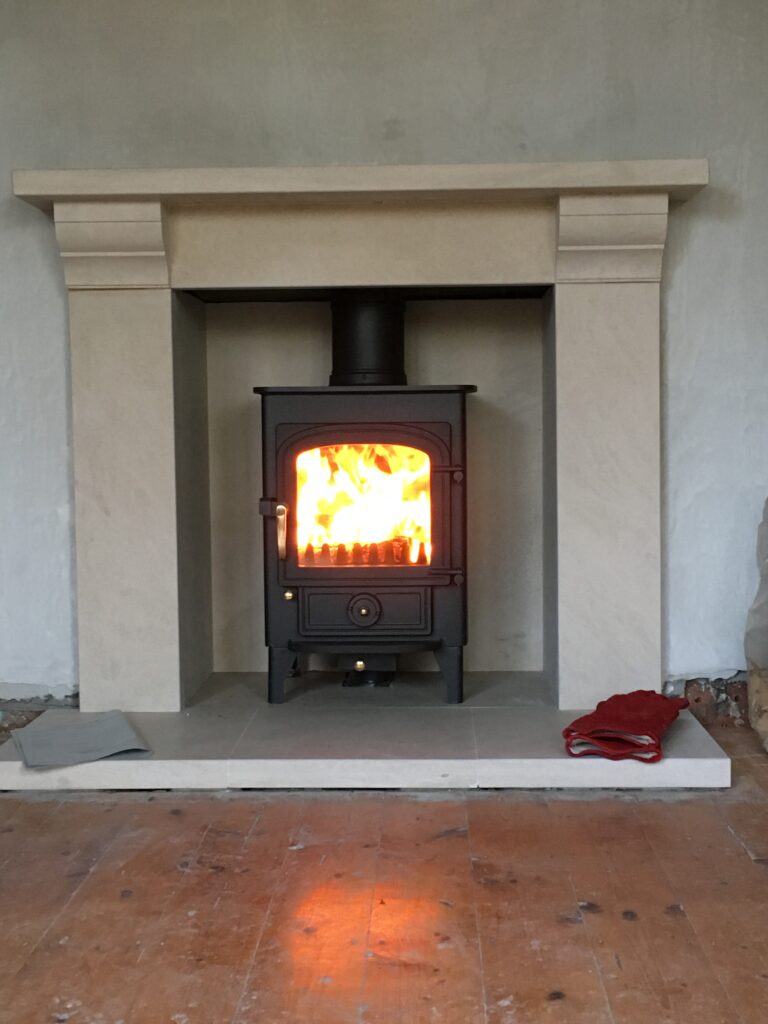 Clearview Pioneer 400 in limestone fireplace