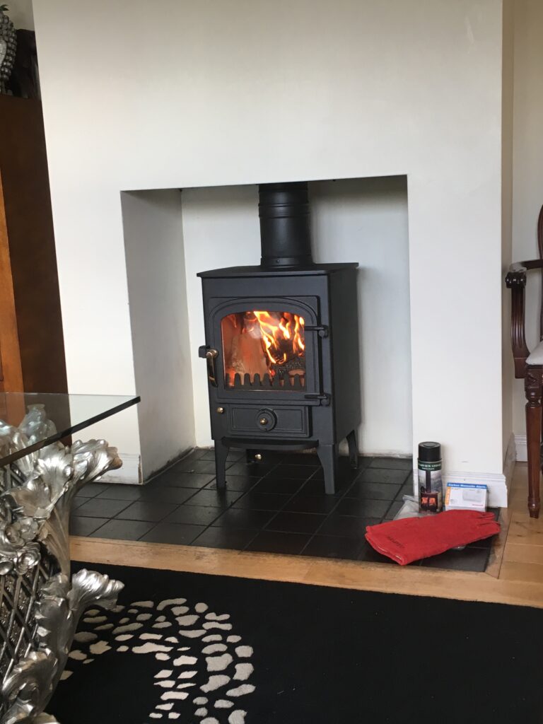Clearview Pioneer 400 in rendered alcove fireplace